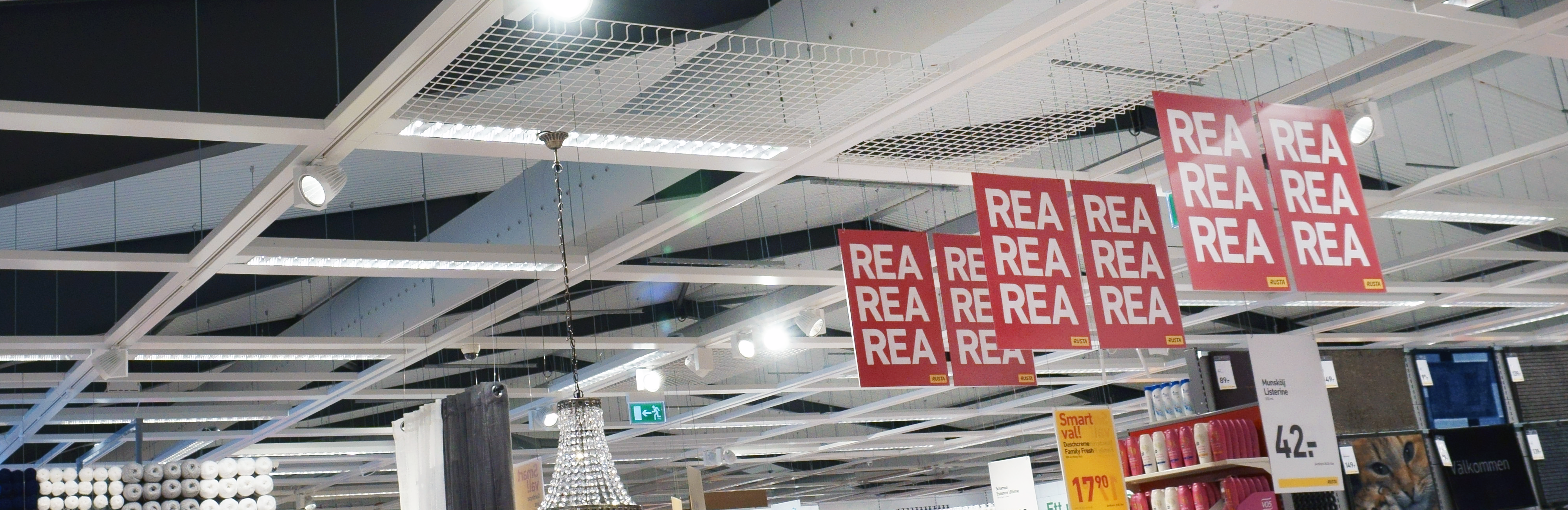 Trådkorg Pendelarmatur för dagligvaruhandel - FLOW. Här med transparent skärm.